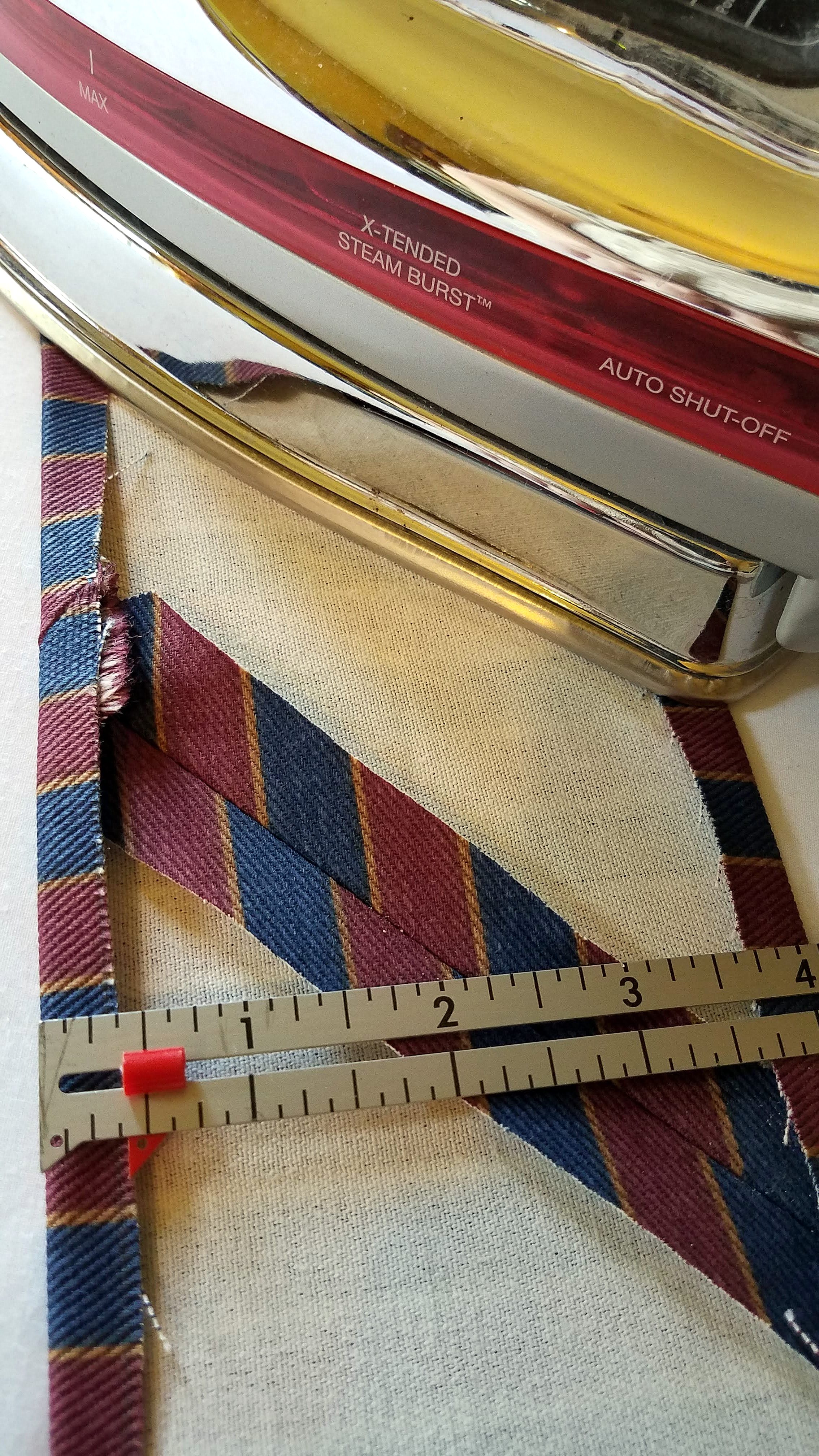 Press under seam allowance on 5 inch strips.jpg