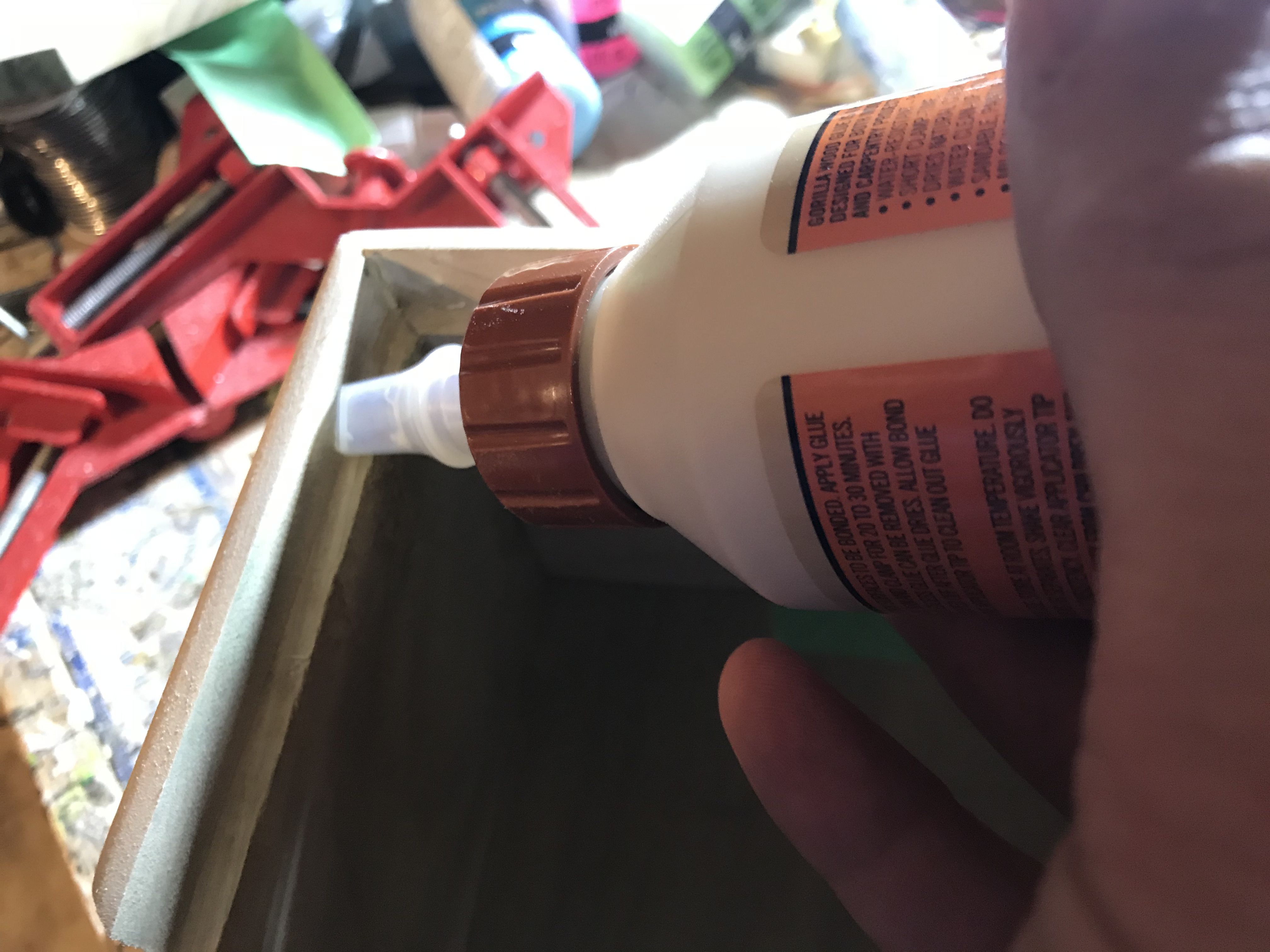 Step 6a - applying glue along the front groove of the case.JPG