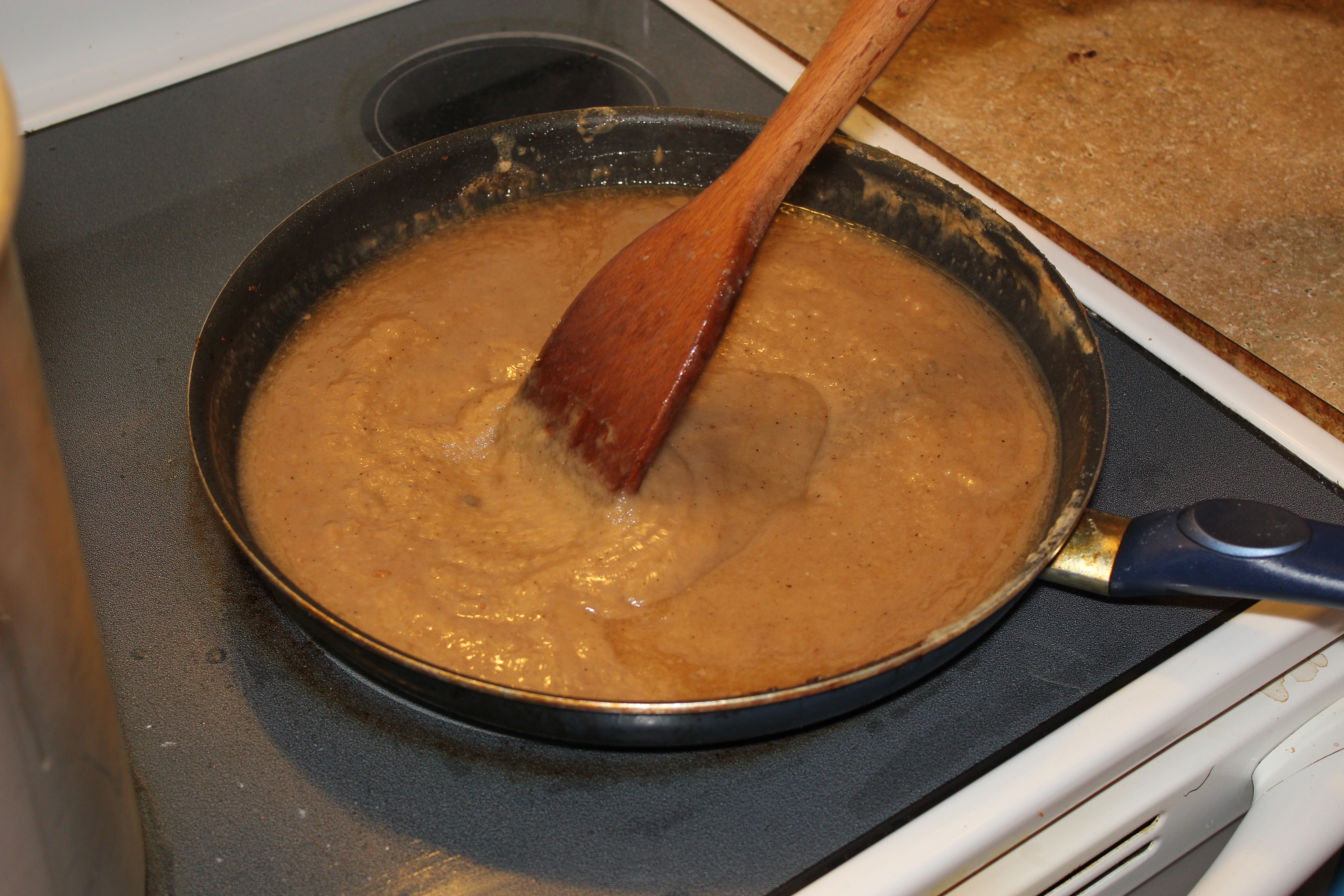 add the broth to the roux slowly (3).JPG