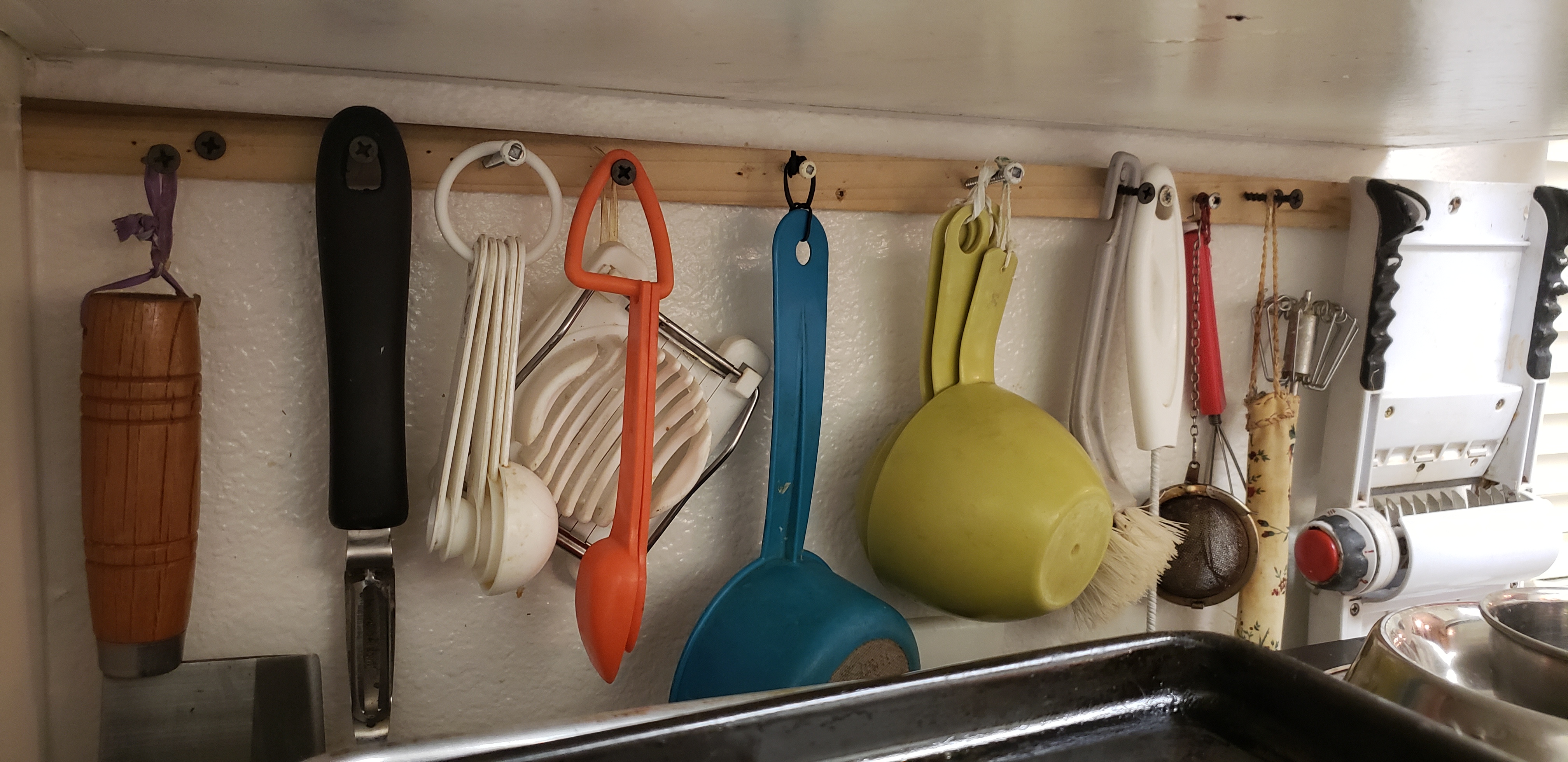 utensils under cupboard.jpg